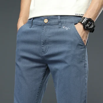 Весна 2023, новые мужские облегающие повседневные брюки в классическом стиле с вышивкой букв, модные брюки, мужские черные, озерно-голубые, светло-серые
